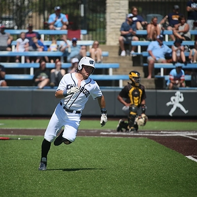 baseball player running during game